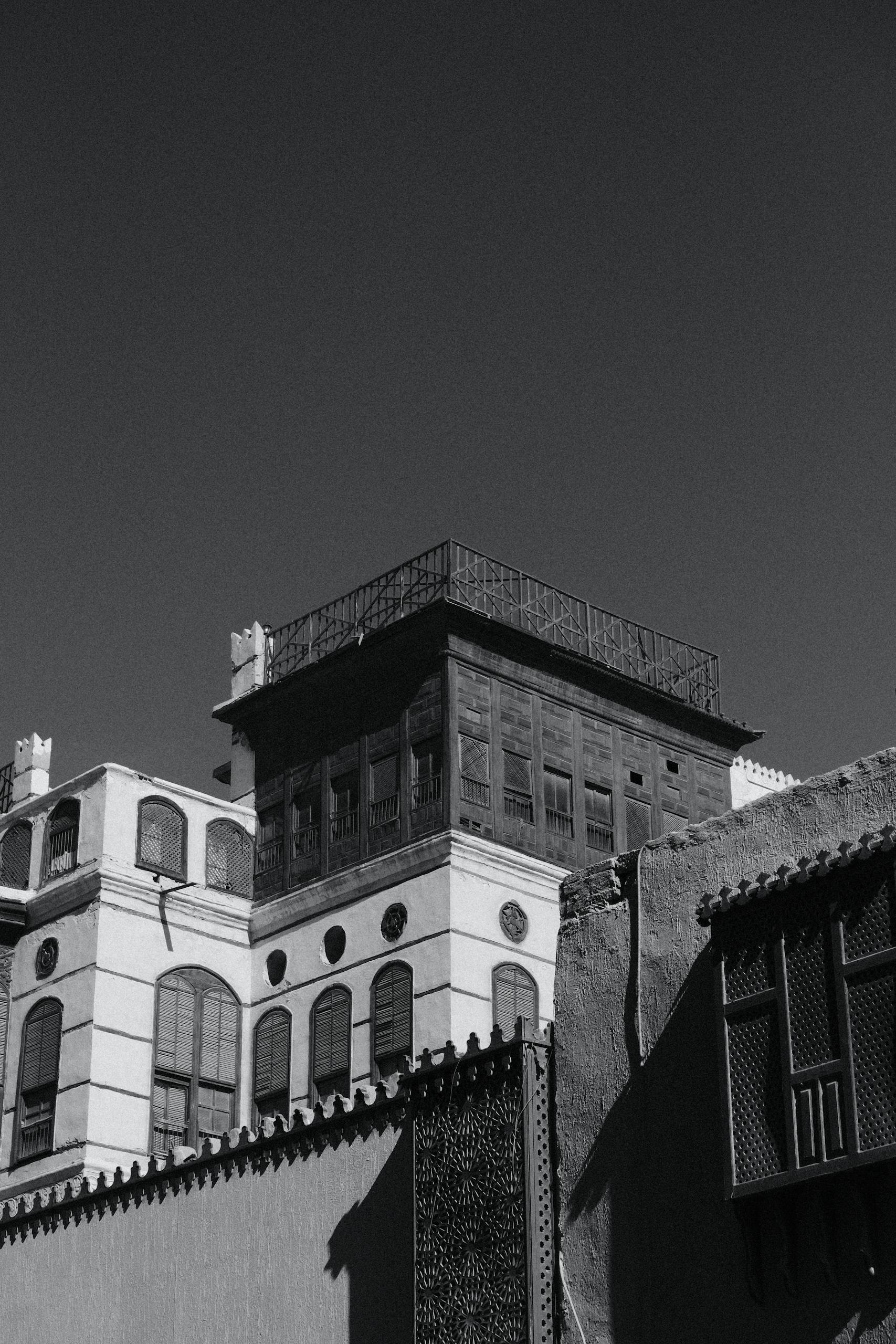 Black and white photo capturing the historic architectural essence of Al-Balad, Jeddah, Saudi Arabia.